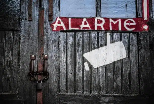 red and white wooden door with love print